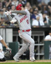 Los Angeles Angels' Shohei Ohtani watches his home run off Chicago White Sox starting pitcher Lucas Giolito during the fourth inning of a baseball game Tuesday, May 30, 2023, in Chicago. (AP Photo/Charles Rex Arbogast)