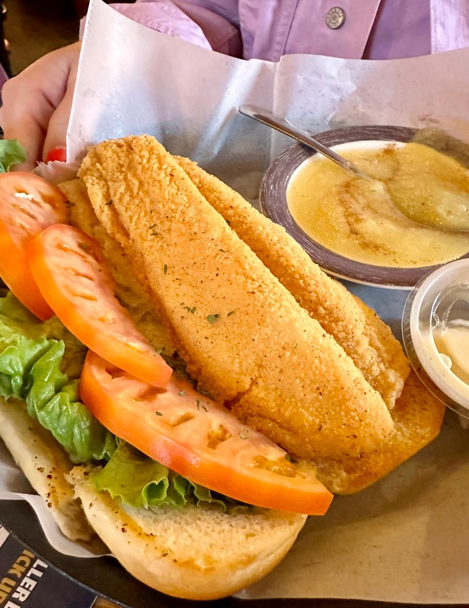 A generous fried fish sandwich on a fresh hoagie bun is on the menu at Joey's Kendal Tavern in Massillon.