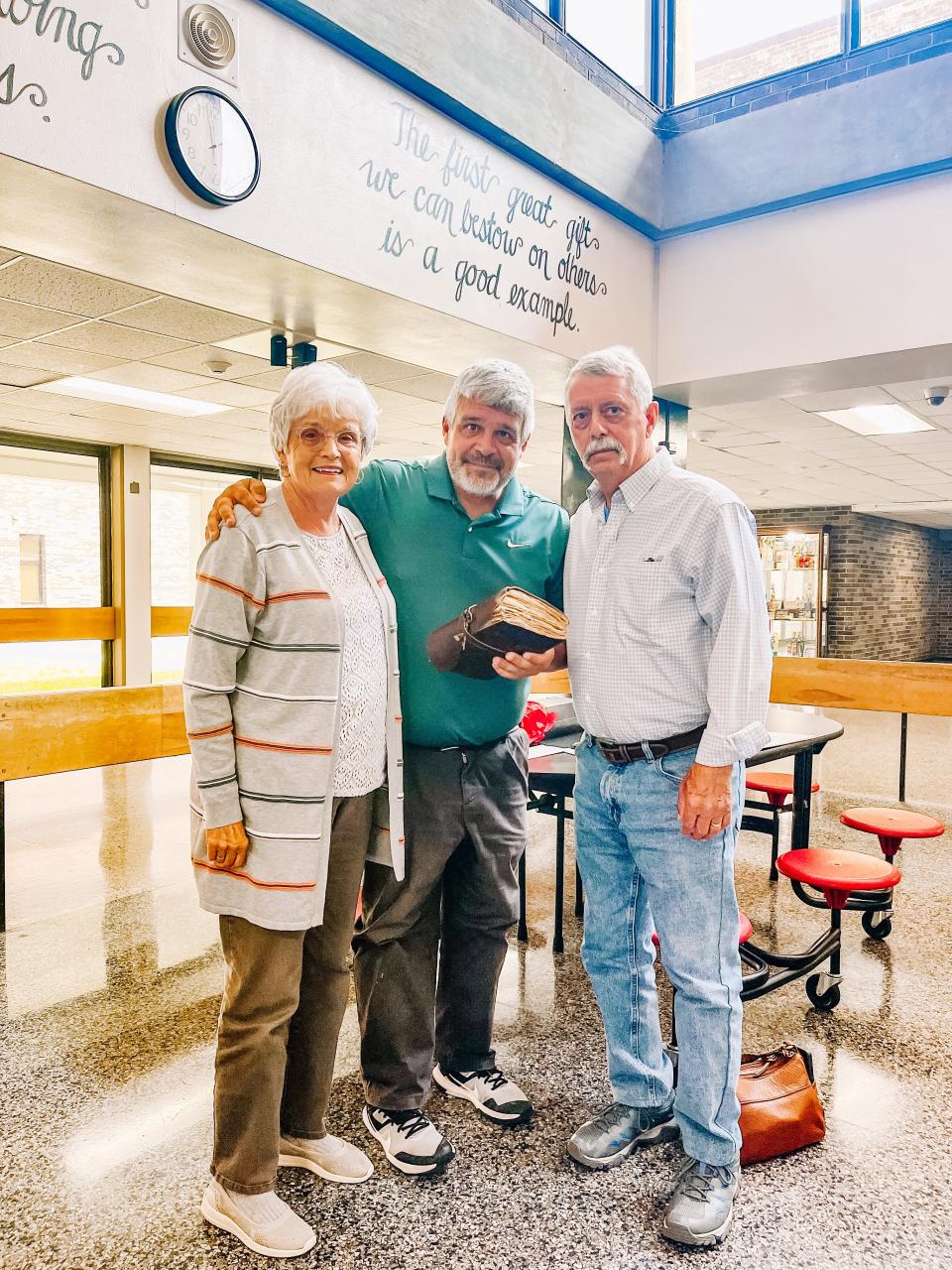 Lambert’s parents, Gail and James Lambert, drove down from Kentucky to be part of the schoolwide celebration and their son’s retirement. Students and staff gifted Lambert with the leather-bound notecards.