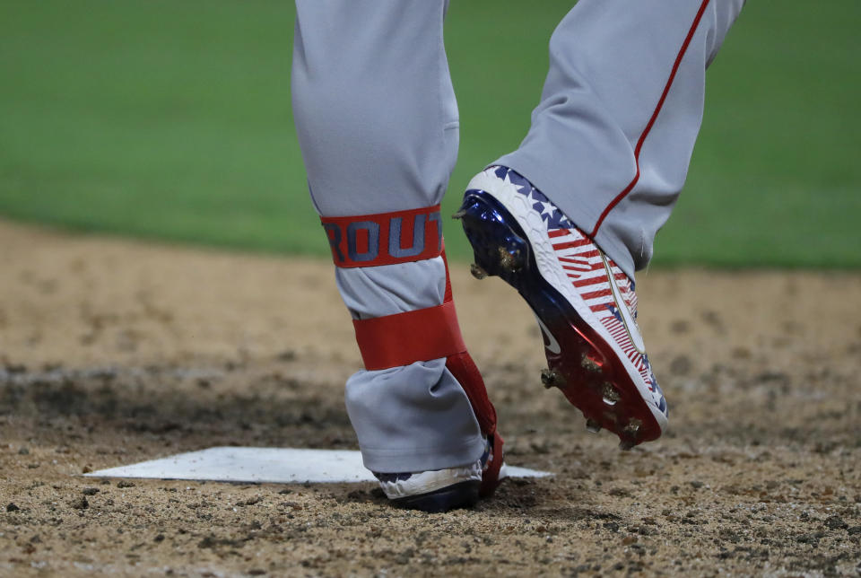 Los Angeles Angels' Mike Trout wears holiday-themed shoes while batting against the Texas Rangers in the seventh inning of a baseball game in Arlington, Texas, Thursday, July 4, 2019. (AP Photo/Tony Gutierrez)