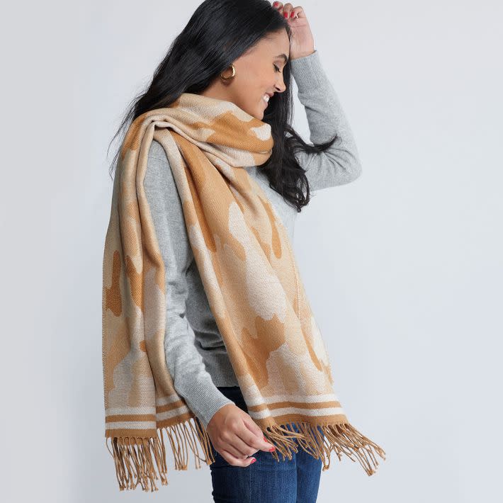 <p><a href="https://go.redirectingat.com?id=74968X1596630&url=https%3A%2F%2Fwww.markandgraham.com%2Fproducts%2Fcamo-print-blanket-scarf%2F&sref=https%3A%2F%2Fwww.housebeautiful.com%2Fshopping%2Fg797%2Fbest-gifts-under-25%2F" rel="nofollow noopener" target="_blank" data-ylk="slk:Shop Now;elm:context_link;itc:0;sec:content-canvas" class="link rapid-noclick-resp">Shop Now</a></p><p>Camo Print Blanket Scarf</p><p>markandgraham.com</p><p>$24.99</p>