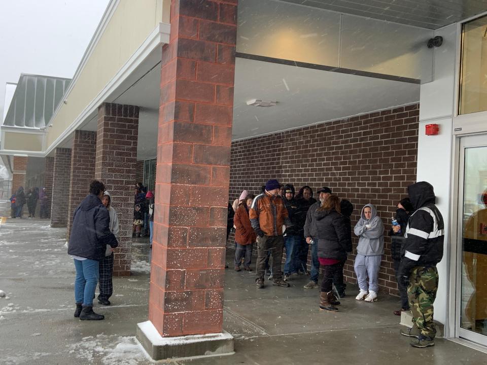 Over 100 customers braved the stormy weather conditions to among the first in line to shop at the new Aldi location in Gardner on Thursday.