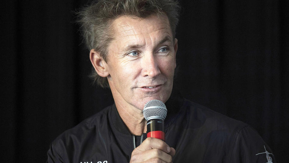 Troy Bayliss, pictured here speaking to the media during a press conference.