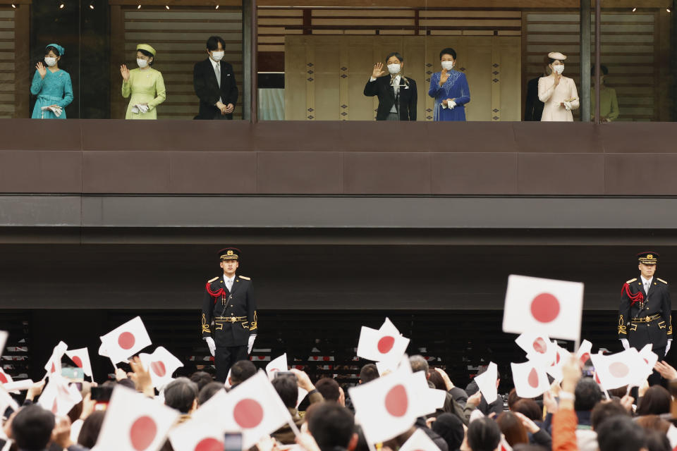 Japan's Emperor Naruhito, fourth left, standing next to Empress Masako, in blue, and their daughter Princess Aiko, in pink, waves to audience members during his birthday celebration at the Imperial Palace in Tokyo, Thursday, Feb. 23, 2023. Crown Prince Akishino, third left, his wife Crown Princess Kiko, second left, and their daughter Princess Kako also stand next to him. (Rodrigo Reyes Marin/Pool Photo via AP)