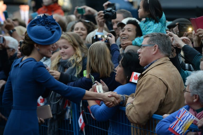 Catherine the Duchess of Cambridge greets onlookers in front of the Legislative Assembly in Victoria, British Columbia, Canada