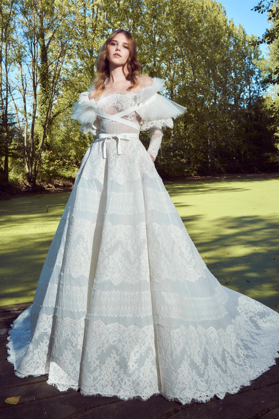 From over-the-top feathers to breezy caftans, these are the trends defining Fall 2019 bridal.