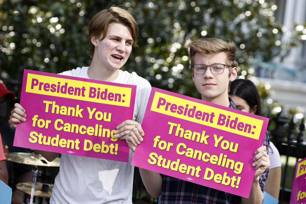 WASHINGTON, DC - AUGUST 25: Student loan borrowers stage a rally in front of The White House to celebrate President Biden cancelling student debt and to begin the fight to cancel any remaining debt on August 25, 2022 in Washington, DC. (Photo by Paul Morigi/Getty Images for We the 45m)