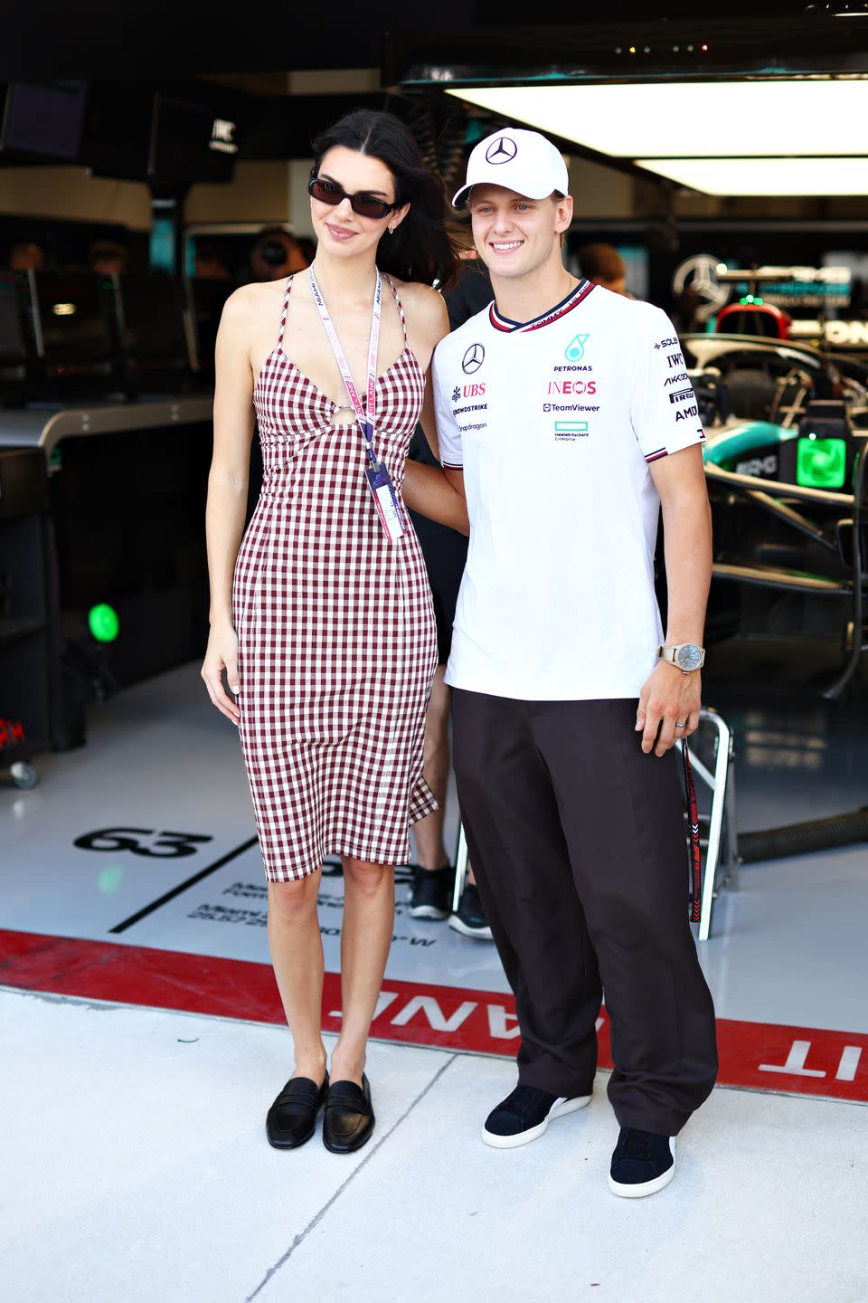 miami, florida may 03 kendall jenner and mick schumacher of germany, reserve driver of mercedes pose for a photo in the mercedes garage during practice prior to round 2 miami of the f1 academy at miami international autodrome on may 03, 2024 in miami, florida photo by clive rose formula 1formula 1 via getty images