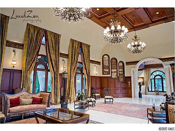 This palatial living room has ample space for the many rose ceremonies to come.