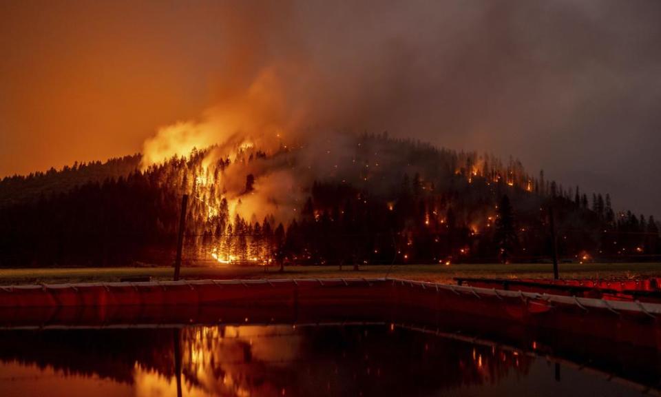 A long exposure photo showing flames from the Dixie Fire in Genesee, California, US.