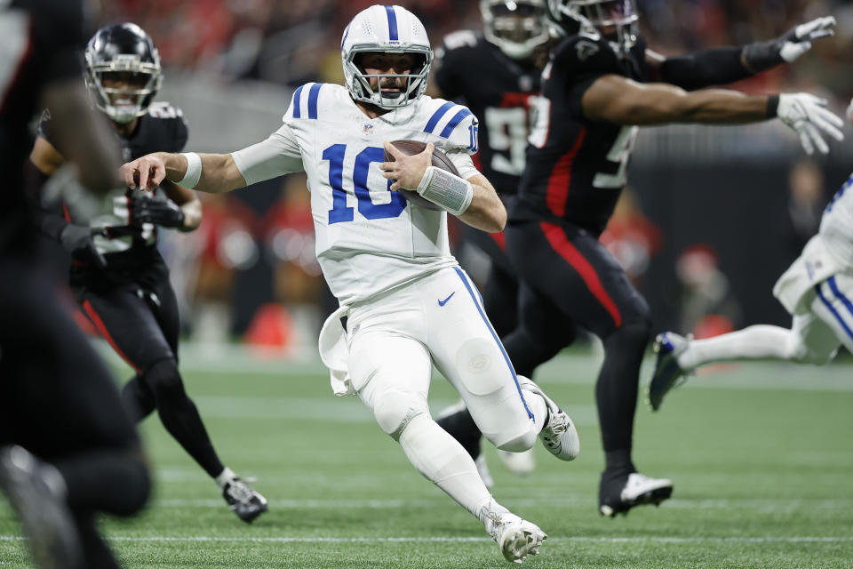 Indianapolis Colts quarterback Gardner Minshew (10) runs down field against the Atlanta Falcons during the second half of an NFL football game, Sunday, Dec. 24, 2023, in Atlanta. (AP Photo/Alex Slitz)