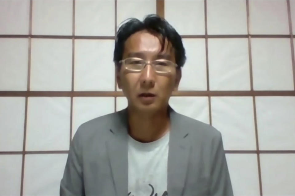 In this image from video released by Foreign Correspondents' Club of Japan, freelance journalist Yuki Kitazumi speaks during a online press conference hosted in Tokyo Friday, May 21, 2021. Kitazumi, who returned home from a Myanmar prison on May 14, said Friday military and police interrogators repeatedly asked him about his friends, clients and fake allegations. And he heard from other inmates about their horrifying prison abuses, including repeated beatings during nonstop, dayslong interrogations. (FCCJ via AP)