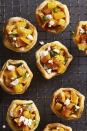 <p>Since these tarts are miniature that means we can eat all of them in one sitting — isn't that how it works?! </p><p>Get the <strong><a href="https://www.goodhousekeeping.com/food-recipes/a46642/butternut-squash-and-feta-tartlets-recipe/" rel="nofollow noopener" target="_blank" data-ylk="slk:Butternut Squash and Feta Tartlets recipe;elm:context_link;itc:0;sec:content-canvas" class="link ">Butternut Squash and Feta Tartlets recipe</a></strong><strong>.</strong> </p><p><strong>RELATED: </strong><a href="https://www.goodhousekeeping.com/food-recipes/g767/butternut-squash-recipes/" rel="nofollow noopener" target="_blank" data-ylk="slk:37 Best Butternut Squash Recipes That Are Easy to Make for Fall;elm:context_link;itc:0;sec:content-canvas" class="link ">37 Best Butternut Squash Recipes That Are Easy to Make for Fall</a></p>