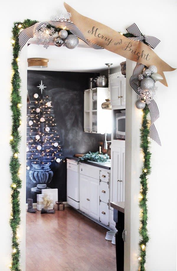 <p>If you've got a chalkboard wall (jealous), you need to draw a Christmas tree on it.</p><p>See more at <a href="http://www.huntedinterior.com/2013/12/holla-day-home-tour.html#.VhQ2bLRVhBc" rel="nofollow noopener" target="_blank" data-ylk="slk:Hunted Interior;elm:context_link;itc:0;sec:content-canvas" class="link ">Hunted Interior</a>. </p>