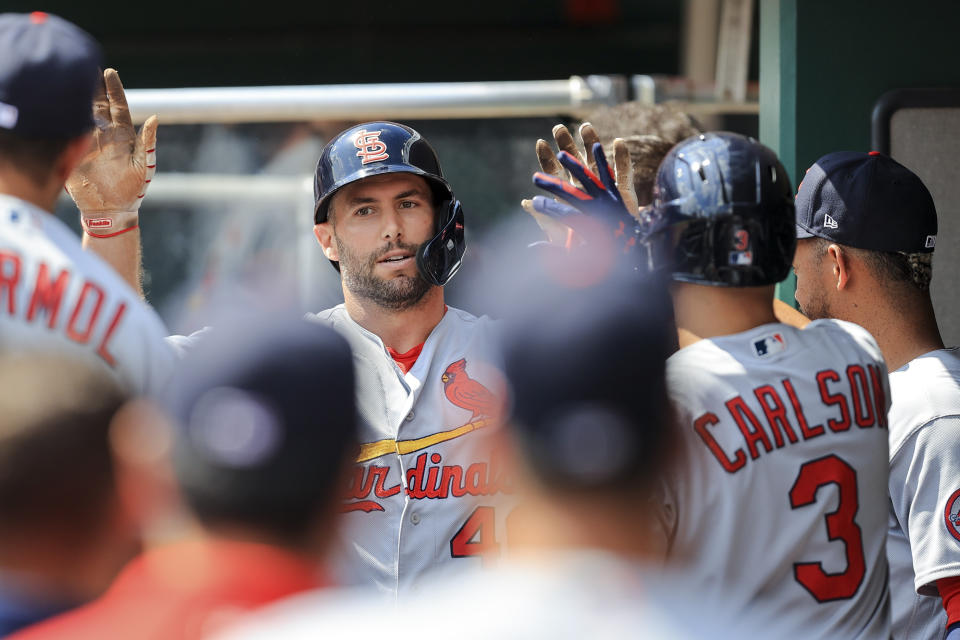 St. Louis Cardinals' Paul Goldschmidt celebrates with teammates after hitting a two-run home run during the fourth inning of the first game of a doubleheader baseball game against the Cincinnati Reds in Cincinnati, Wednesday, Sept. 1, 2021. (AP Photo/Aaron Doster)