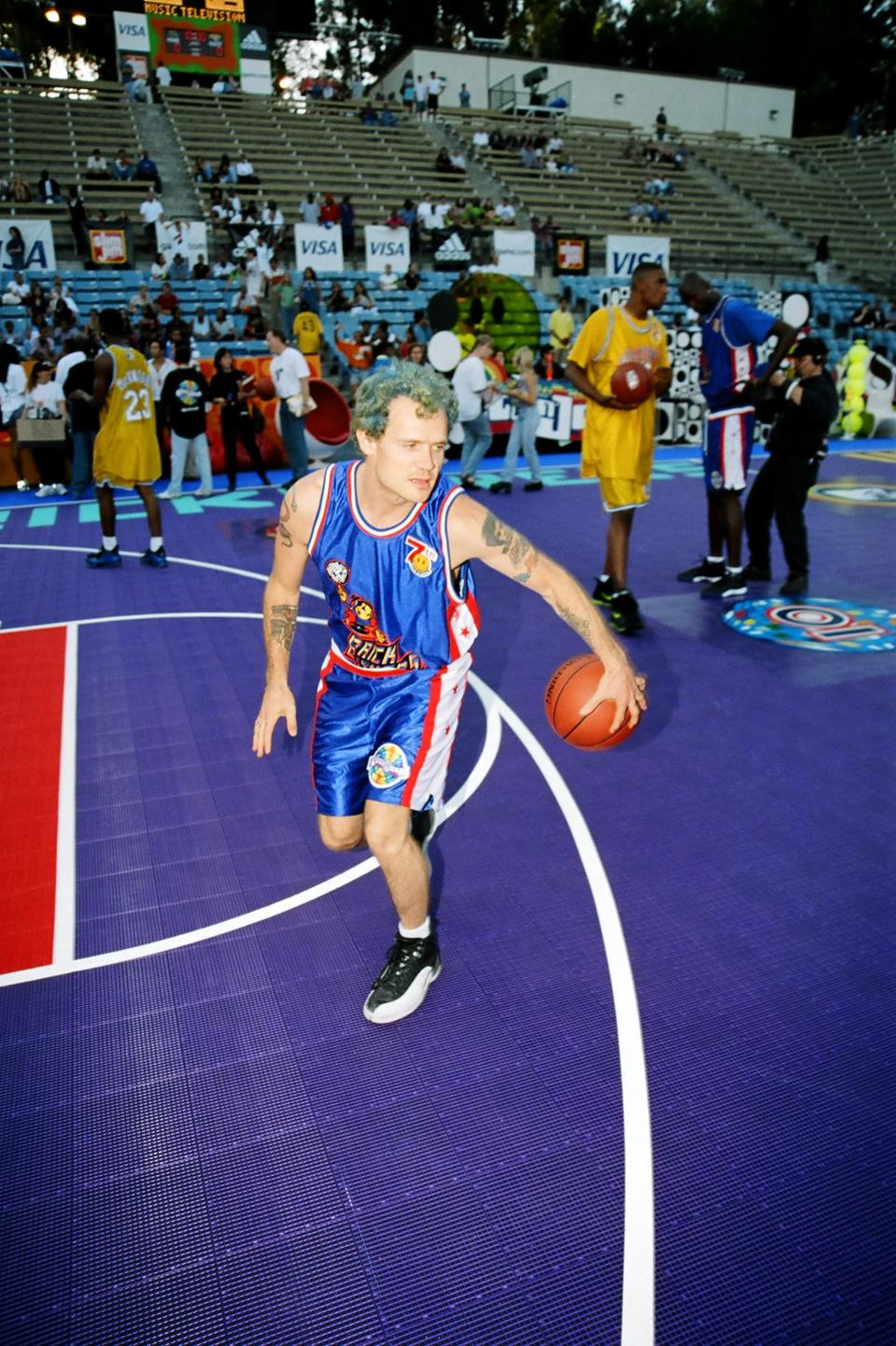 FLEA
Los Angeles, 1997
Flea is a courtside fixture now, but the RHCP bassist was an MTV Rock n’ Jock MVP back in the day.