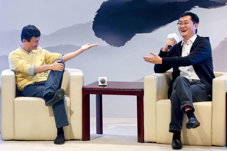 Jack Ma (left) and Pony Ma at the 2013 launch of ZhongAn, an insurance venture in which Alibaba and Tencent invested. Today, the companies avoid backing the same projects and often invest in rivals in the same industry.