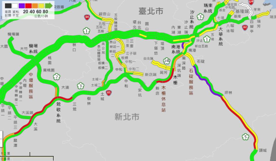 ▲228連假今（28）日登場，國道就湧現不少出遊車潮，石碇到坪林一早就「紫爆」。(圖／擷取自高公局)