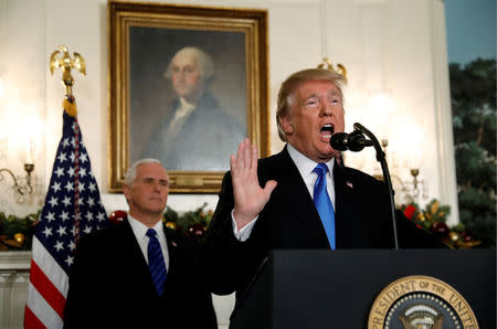 FILE PHOTO: With Vice Pence Mike Pence looking on, U.S. President Donald Trump gives a statement on Jerusalem, during which he recognized Jerusalem as the capital of Israel, in the Diplomatic Reception Room of the White House in Washington, U.S., December 6, 2017. REUTERS/Kevin Lamarque/File Photo