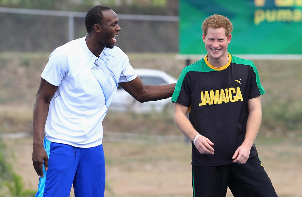 Prince Harry raced Usain Bolt at the University of the West Indies in March 2012 in Kingston, Jamaica, during an extensive tour. The pair looked like they enjoyed hanging out. (Chris Jackson/Getty Images)