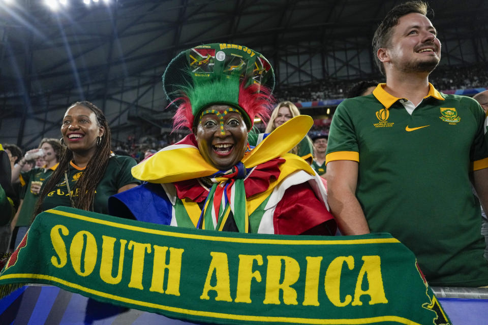 South Africa's fans pose in the stands before the Rugby World Cup Pool B match between South Africa and Tonga, at Marseille's Stade Velodrome, France Sunday, Oct. 1, 2023. (AP Photo/Pavel Golovkin)