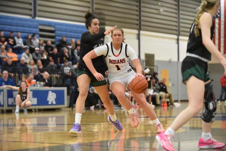 Tecumseh's Alli Zajac drives the ball toward the basket during Tuesday's Division 2 quarterfinal against Ann Arbor Father Gabriel Richard at Ypsilanti Lincoln.