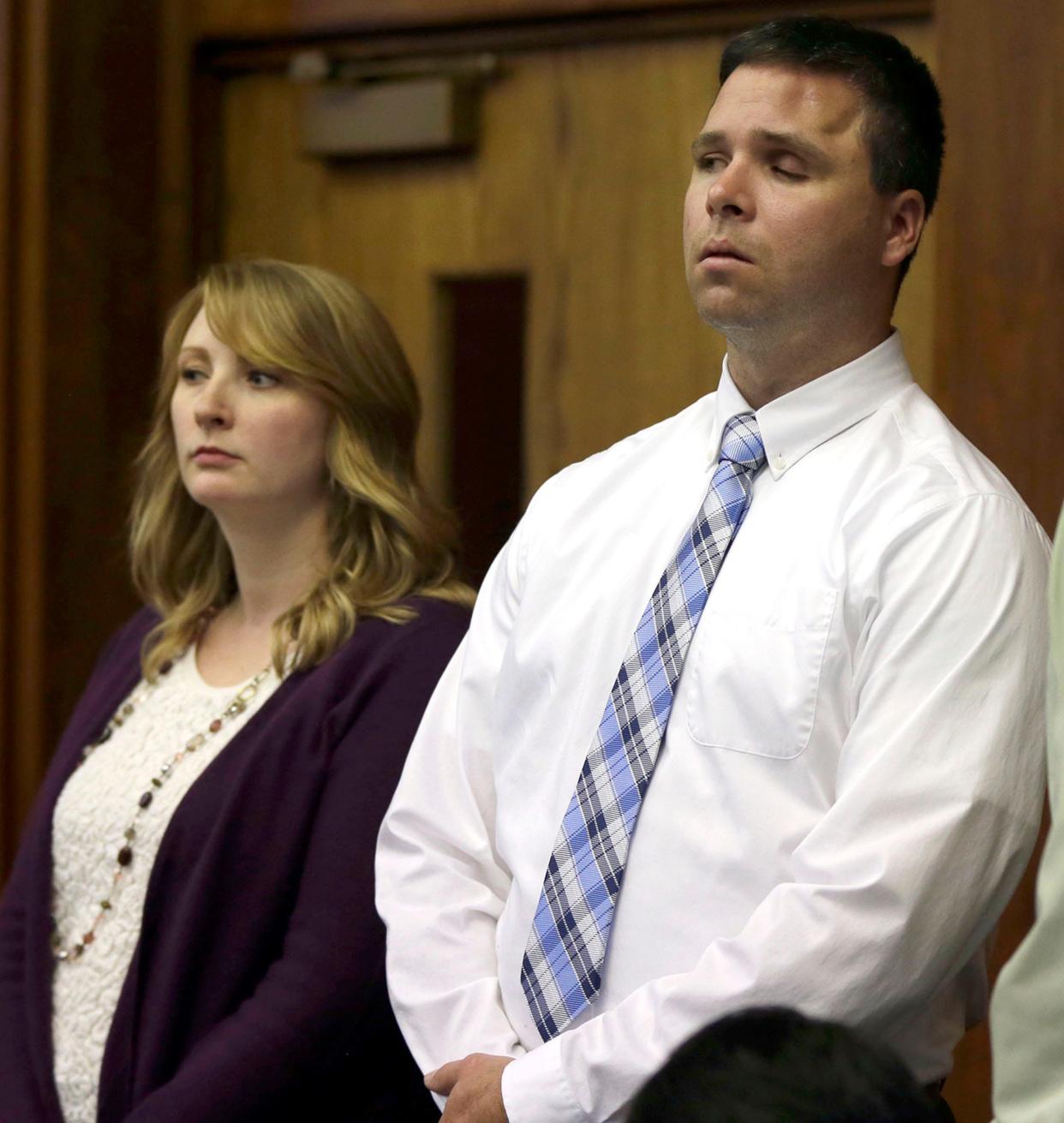 Former Milwaukee police officer Graham Kunisch and Kunisch's wife, Margaret Kunisch, are seen in court during the Badger Guns trial in a Milwaukee County Court on Wednesday, October 7, 2015. Graham Kunisch suffered brain damage after being shot by Julius Burton when Jacob Collins legally purchased a gun at Badger Guns and gave it to Julius Burton, in exchange for cash in May of 2009.