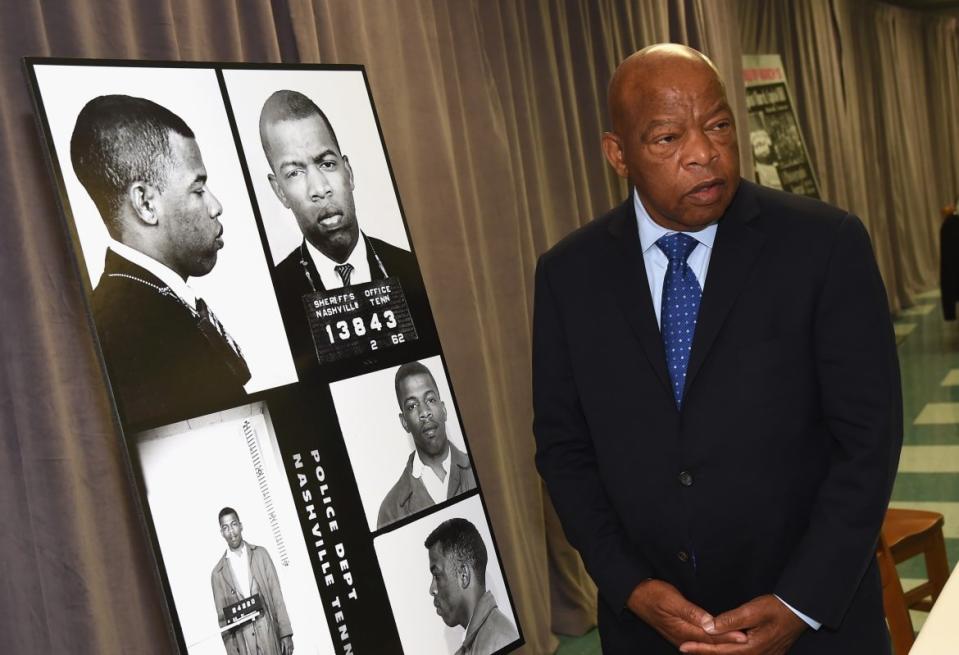 <div class="inline-image__caption"><p>John Lewis views for the first time images and his arrest record for leading a nonviolent sit-in at Nashville's segregated lunch counters, March 5, 1963. </p></div> <div class="inline-image__credit">Rick Diamond/Getty</div>