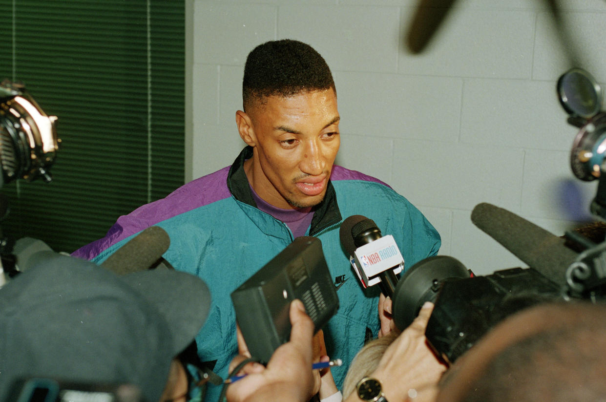Chicago Bulls' Scottie Pippen talks with reporters after basketball practice at the Berto Center in Deerfield, Illinois, on May 24, 1994. Questions are being asked after Pippen sat on the bench as the Bulls beat the Knicks 104-102, on Toni Kukoc's last-second shot. (AP/Todd Rosenberg)
