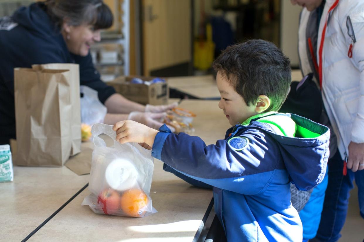 <span class="caption">Eating well makes it easier to concentrate on learning.</span> <span class="attribution"><a class="link " href="https://www.gettyimages.com/detail/news-photo/tyden-brownlee-picks-up-a-free-school-lunch-at-olympic-news-photo/1207638083" rel="nofollow noopener" target="_blank" data-ylk="slk:Karen Ducey/Stringer via Getty Images;elm:context_link;itc:0;sec:content-canvas">Karen Ducey/Stringer via Getty Images</a></span>