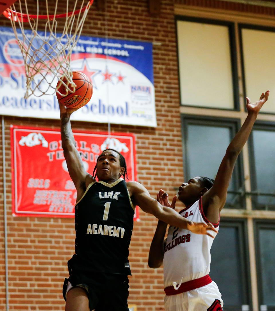 Link Academy's Labaron Philon attempts a field goal as the Lions took on the Central Bulldogs in The Pit at Central High School on Tuesday, Nov. 28, 2023.