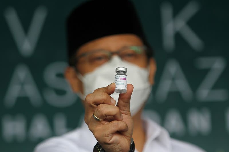 FILE PHOTO: Indonesiam Health Minister Budi Gunadi Sadikin at mass vaccination in Surabaya