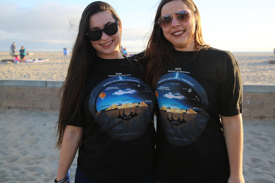 *** EXCLUSIVE - VIDEO AVAILABLE ***  ORANGE COUNTY, CALIFORNIA - MARCH 25: Two women wearing Flat Earth t-shirts at a Flat Earther meet-up on March 25, 2017, in Orange County, California.   THERE is an ever-growing community of people who reject scientific wisdom and insist that the world is FLAT. Nathan Thompson, 31, a network marketer based in Orange County, California, set up the Official Flat Earth and Globe Discussion group on Facebook in June 2016. The group now boasts more than 42,000 members and even Nathan has been taken aback by its rapid growth. These Flat Earthers believe that our planet is encircled by a giant, heavily-policed ice wall and that gravity is just an unproven theory. They also claim that NASA is a fraudulent organisation and that all the photographs and video footage we have from space are computer-generated imagery (CGI). And while their views may sound far-fetched, the movement has attracted a number of celebrity adherents in recent months, including rapper B.o.B., former reality TV star Tila Tequila and basketball legend Shaquille ONeal.  PHOTOGRAPHY BY Joel Forrest / Barcroft Images  London-T:+44 207 033 1031 E:hello@barcroftmedia.com - New York-T:+1 212 796 2458 E:hello@barcroftusa.com - New Delhi-T:+91 11 4053 2429 E:hello@barcroftindia.com www.barcroftimages.com (Photo credit should read Joel Forrest / Barcroft Media via Getty Images / Barcroft Media via Getty Images)