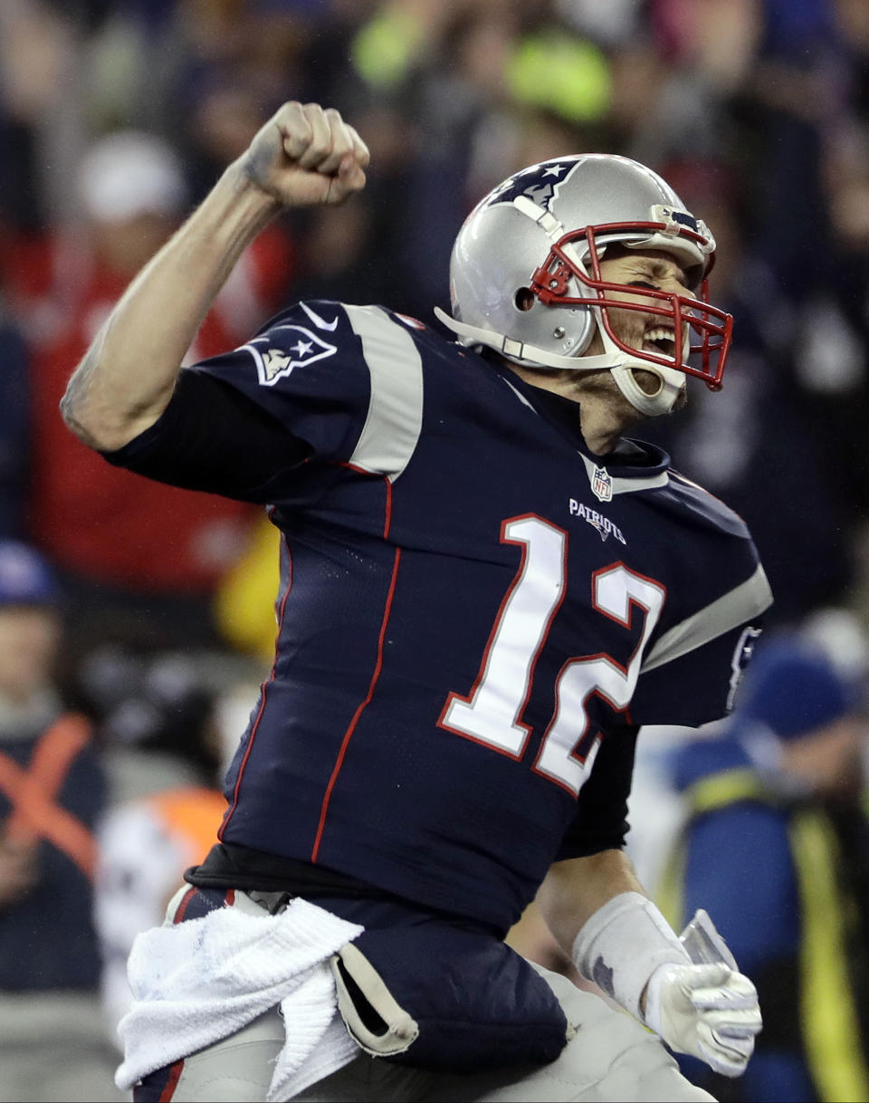 New England Patriots quarterback Tom Brady reacts after throwing a touchdown pass to Julian Edelman during the second half of the AFC championship NFL football game against the Pittsburgh Steelers, Sunday, Jan. 22, 2017, in Foxborough, Mass. (AP Photo/Matt Slocum)