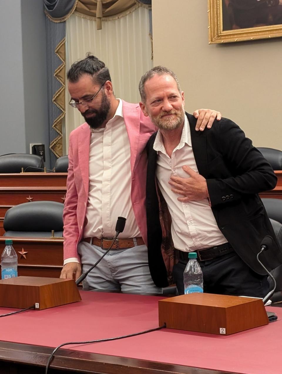 Aziz Abu Sarah and Maoz Inon embrace after campaigning for peace (Image courtesy of Maoz Inon)