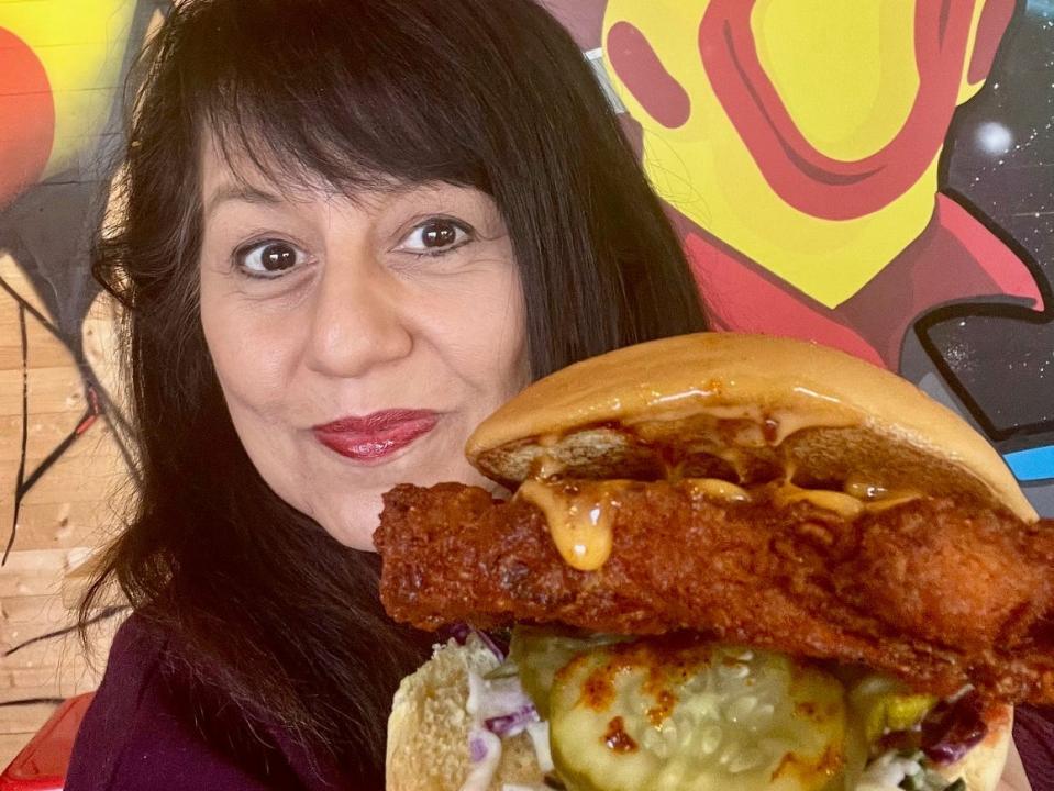 Nancy Luna, Business Insider's food and restaurants correspondent, reviews the fried cauliflower sandwich at Dave's Hot Chicken.