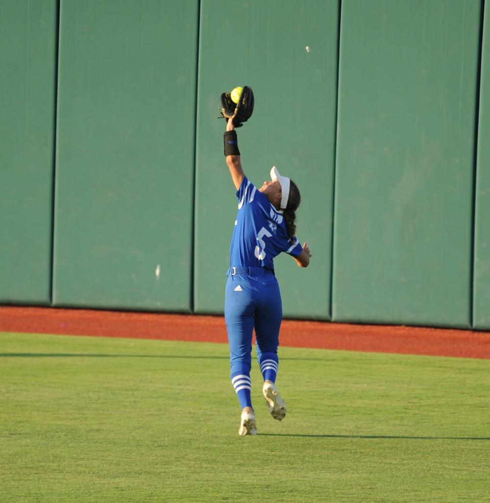 Stamford's Savana Gonzales catches a ball on the run against Lovelady in the state semifinals.
