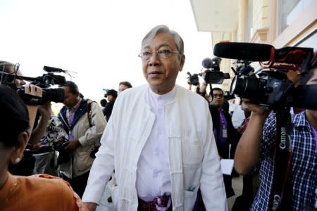 FILE PHOTO- Htin Kyaw, the National League for Democracy (NLD) nominated presidential candidate for the lower house of parliament, arrives at Parliament in Naypyitaw February 1, 2016. REUTERS/Soe Zeya Tun Tun/File Photo