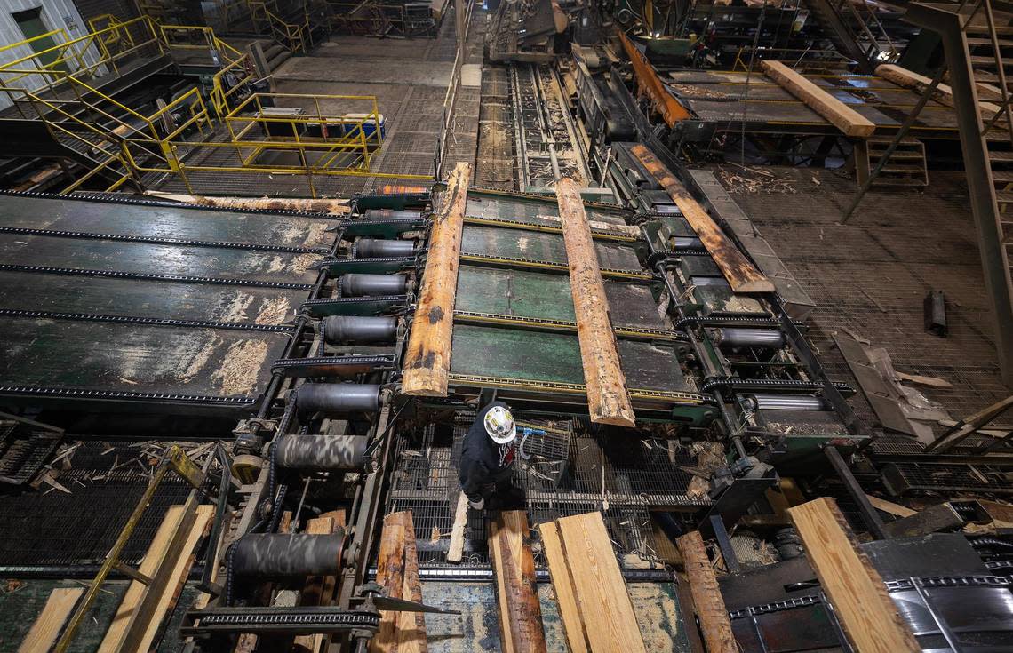 Wood is cut in the process of making planks Oct. 19, 2022, at Ward Timber in Linden. Production at the mill would be heavily impacted if bottomland woods are flooded for the Marvin Nichols Reservoir project.