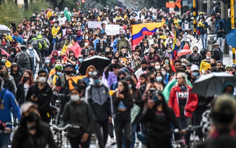 Demonstrators take part in a protest against a tax reform proposed by Colombian President Ivan Duque's government in Bogota, on May 4. / Credit: JUAN BARRETO/AFP via Getty Images