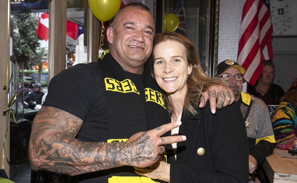 Shane Martin and Australian actress Rachel Griffiths, pictured here watching the AFL grand final in 2019.