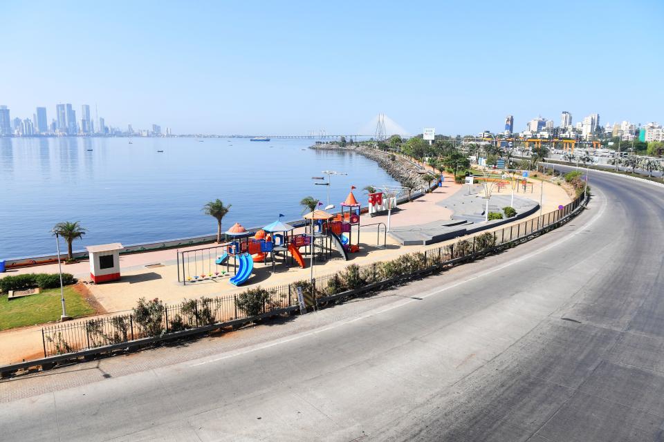 A general view of deserted roads is seen during a one-day Janata (civil) curfew imposed as a preventive measure against the COVID-19 coronavirus, in Mumbai on March 22, 2020. - Nearly one billion people around the world were confined to their homes, as the coronavirus death toll crossed 13,000 and factories were shut in worst-hit Italy after another single-day fatalities record. (Photo by INDRANIL MUKHERJEE / AFP) (Photo by INDRANIL MUKHERJEE/AFP via Getty Images)