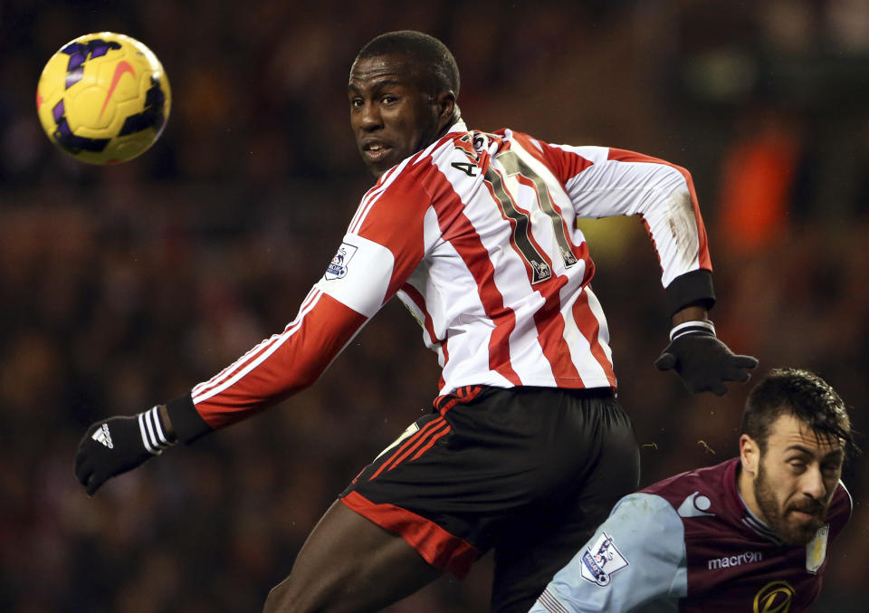 FILE - In this Jan. 1, 2014, file photo, Sunderland's Jozy Altidore, left, watches a shot toward goal past Aston Villa's Antonio Luna, right, during an English Premier League soccer match in Sunderland, England. Altidore, one of the U.S. soccer team's top goal scorers continued to struggle last weekend. Altidore, who tied for the team lead with eight goals last year in 14 appearances for the Americans, was scoreless in Saturday's 1-0 win for Sunderland in the FA Cup. The forward has scored just one goal in the English Premier League this season, (AP Photo/Scott Heppell, File)