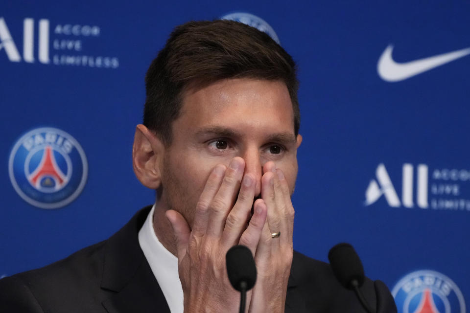 Lionel Messi attends a press conference Wednesday, Aug. 11, 2021 at the Parc des Princes stadium in Paris. Lionel Messi said he's been enjoying his time in Paris "since the first minute" after he signed his Paris Saint-Germain contract on Tuesday night. The 34-year-old Argentina star signed a two-year deal with the option for a third season after leaving Barcelona. (AP Photo/Francois Mori)