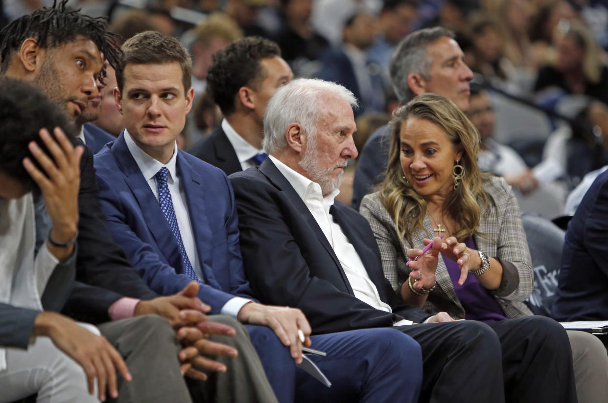 San Antonio Spurs assistant coache Will Hardy, second from left, with Tim Duncan, Greg Popovich and Becky Hammon. (Ronald Cortes/Getty Images)