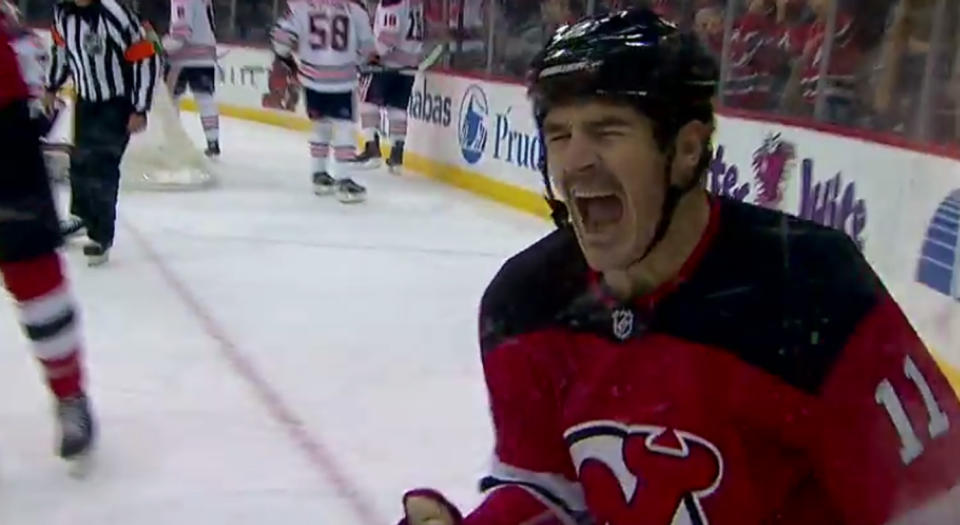 Brian Boyle reacts to scoring his first goal with the New Jersey Devils. (Courtesy MSG/NHL.com)