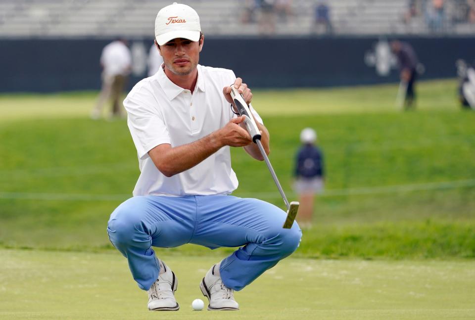 Former Texas golfer Cole Hammer lines up a putt during the 2021 U.S. Open. Hammer, after helping lead the Longhorns to the national championship this year, turned professional and will play in this week's Travelers Championship.