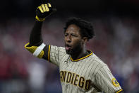 San Diego Padres' Jurickson Profar reacts after striking out during the ninth inning in Game 3 of the baseball NL Championship Series between the San Diego Padres and the Philadelphia Phillies on Friday, Oct. 21, 2022, in Philadelphia. (AP Photo/Brynn Anderson)