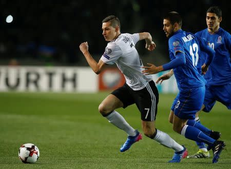 Soccer Football - Azerbaijan v Germany - 2018 World Cup Qualifying European Zone - Group C - Tofiq Bahramov Stadium, Baku, Azerbaijan - 26/03/17 Germany's Julian Draxler and Azerbaijan's Dmitri Nazarov in action. REUTERS/David Mdzinarishvili