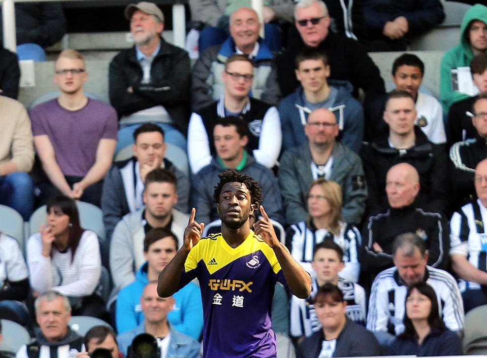 Swansea City's Wilfried Bony celebrates his goal during their English Premier League soccer match against Newcastle United at St James' Park, Newcastle, England, Saturday, April 19, 2014. (AP Photo/Scott Heppell)